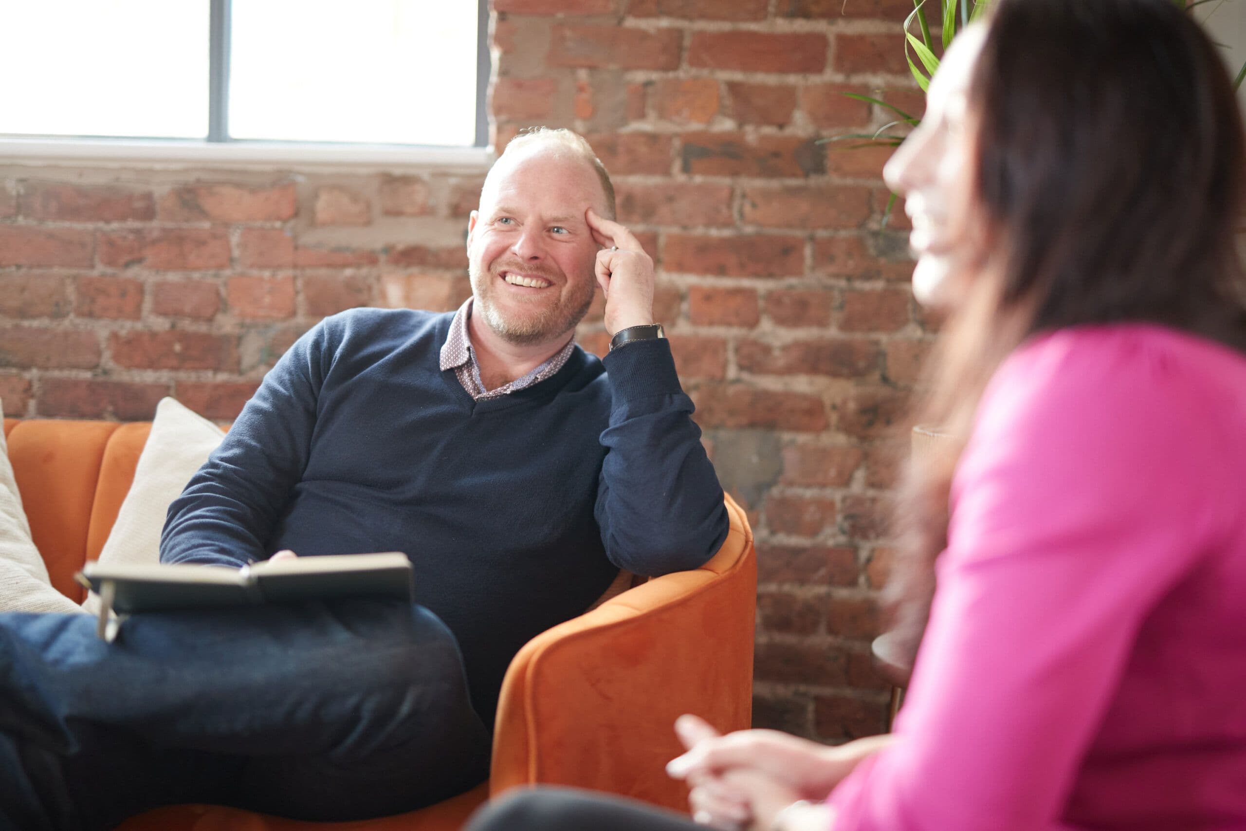 NVC meeting with two people talking